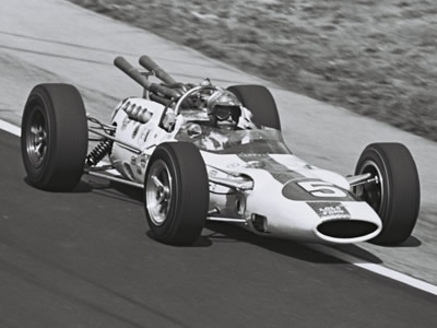 Bud Tingelstad in Lindsey Hopkins' American Red Ball Lola T80 at the 1965 Indy 500. Part of the Dave Friedman collection. Licenced by The Henry Ford under Creative Commons licence Attribution-NonCommercial-NoDerivs 2.0 Generic. Original image has been cropped. Bud Tingelstad in Lindsey Hopkins' American Red Ball Lola T80 at the 1965 Indy 500. Part of the Dave Friedman collection. Licenced by The Henry Ford under Creative Commons licence Attribution-NonCommercial-NoDerivs 2.0 Generic. Original image has been cropped.
