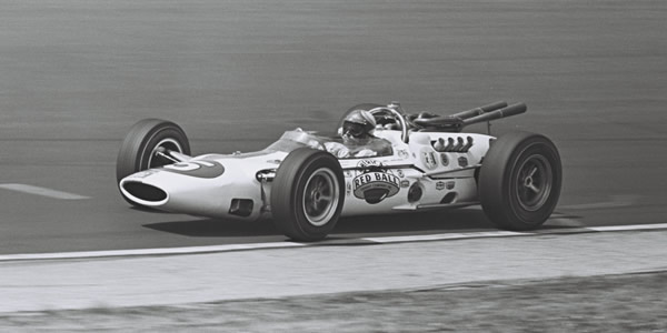 Bud Tingelstad in Lindsey Hopkins' Lola T80. Part of the Dave Friedman collection. Licenced by The Henry Ford under Creative Commons licence Attribution-NonCommercial-NoDerivs 2.0 Generic. Original image has been cropped. Bud Tingelstad in Lindsey Hopkins' Lola T80. Part of the Dave Friedman collection. Licenced by The Henry Ford under Creative Commons licence Attribution-NonCommercial-NoDerivs 2.0 Generic. Original image has been cropped.
