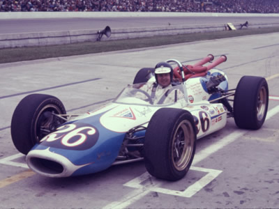 George Snider after qualifying his Mongoose for the 1967 Indy 500. Part of the Dave Friedman collection. Licenced by The Henry Ford under Creative Commons licence Attribution-NonCommercial-NoDerivs 2.0 Generic. Original image has been cropped.