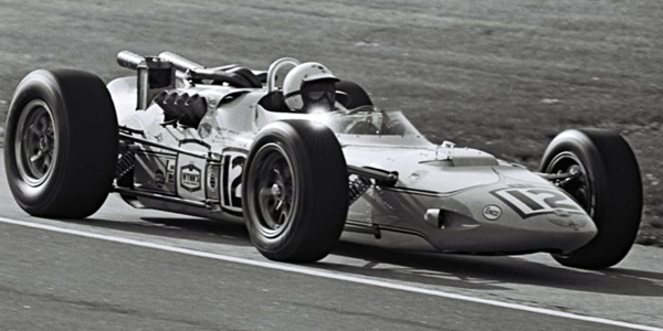 Chuck Hulse in the 1966 Watson at the 1966 Indianapolis 500.  Part of the Dave Friedman collection. Licenced by The Henry Ford under Creative Commons licence Attribution-NonCommercial-NoDerivs 2.0 Generic. Original image has been cropped.
