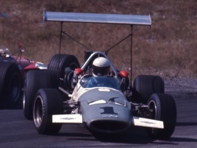 Sam Posey getting tangled up in his McLaren M10A at Mosport Park in August 1969. Copyright Thomas Horat 2011. Used with permission. Sam Posey getting tangled up in his McLaren M10A at Mosport Park in August 1969. Copyright Thomas Horat 2011. Used with permission.