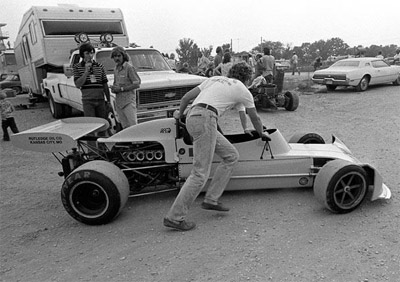 Tim Cooper's March 73B, in the pits at Mid-America Raceways in 1974, probably at the September SCCA National. Copyright David Hutson 2011. Used with permission.