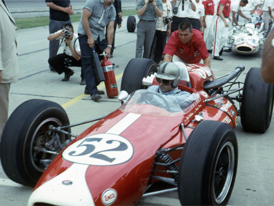 Jack Brabham leaves the pits in his Brabham BT12 at the 1964 Indy 500.  Copyright Indianapolis Motor Speedway. Copyright permissions granted for non-commercial use by Indianapolis Motor Speedway.