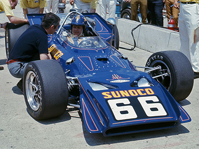 Roger Penske talks to Mark Donohue in his Sunoco Lola T153 at the 1970 Indy 500.  Copyright Indianapolis Motor Speedway. Copyright permissions granted for non-commercial use by Indianapolis Motor Speedway.