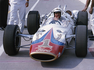 AJ Foyt in his backup Lola T80 during practice for the 1965 Indy 500.  Copyright Indianapolis Motor Speedway. Copyright permissions granted for non-commercial use by Indianapolis Motor Speedway.