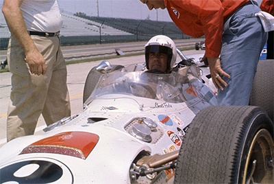 Chuck Hulse in his "ex-Graham Hill" Lola T90 during practice for the 1967 Indy 500. Copyright International Motor Speedway. Used with permission.