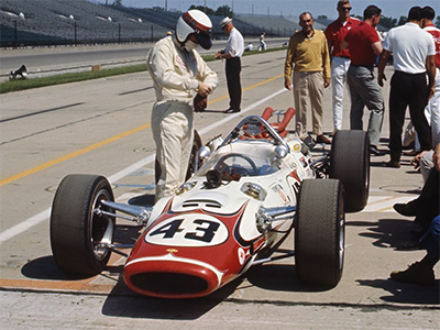 Jackie Stewart with his Lola T90 at the Indianapolis Motor Speedway in 1966. Copyright International Motor Speedway. Used with permission.