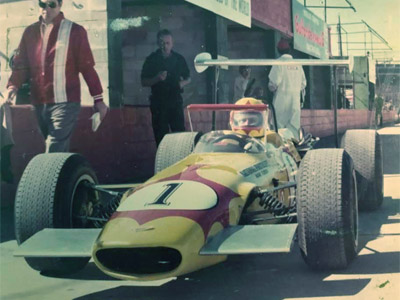 Hugh Kleinpeter's Chevron B15b in the pits at the Pro race at Sebring in December 1969. Copyright Ken Kleinpeter 2020. Used with permission.