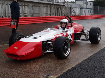 Simon Armer in his Petonyer-liveried ex-Tom Walkinshaw March 703 at Silverstone in October 2013. Copyright Keith Lewcock 2019. Used with permission.