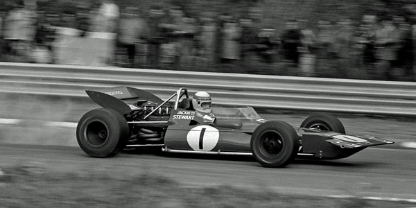 Blue smoke starts to gush from Jackie Stewart's Tyrrell 001 at the 1970 United States GP, presaging its retirement from the lead. Copyright Norm MacLeod 2017. Used with permission. Blue smoke starts to gush from Jackie Stewart's Tyrrell 001 at the 1970 United States GP, presaging its retirement from the lead. Copyright Norm MacLeod 2017. Used with permission.