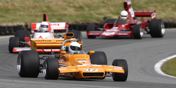 Bryan Sala in his Matich A50/51 leads Bill Hemming (Elfin MR8 A-C) and Paul Zazryn (Lola T332) at Teretonga in February 2013.  Copyright Alex Mitchell 2013.  Used with permission.