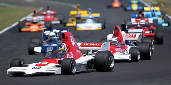 Michael Lyons leads Andrew Higgins at Hampton Downs in their matching ex-Vel's Parnelli Jones Lola T400s.  Copyright Fast Company/Alex Mitchell 2014.  Used with permission.