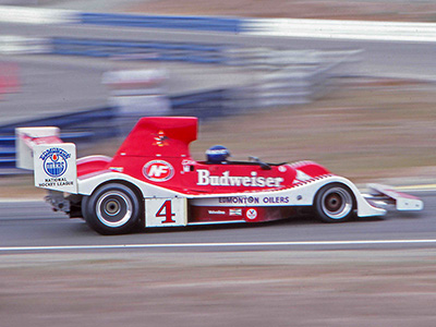 Elliot Forbes-Robinson in his Spyder NF-11 at Laguna Seca in 1979. Copyright Bob Moffett 2026. Used with permission.