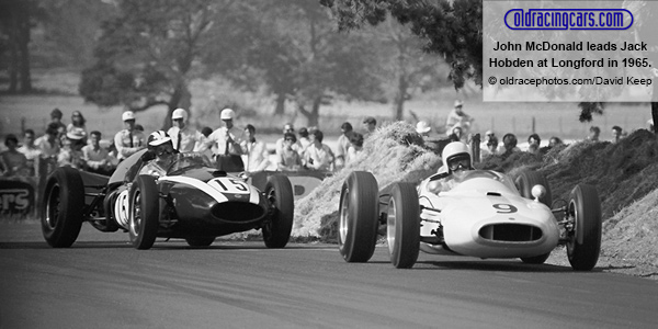 John McDonald in Bill Patterson's Cooper leads Jack Hobden during practice for the Australian Grand Prix at Longford in 1965.  Copyright oldracephotos.com/David Keep.  Used with permission.