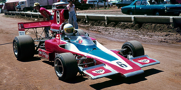 Max Stewart in his Lola T330 at Phillip Island in 1974.  Copyright oldracephotos.com/Neil Hammond. Used with permission.