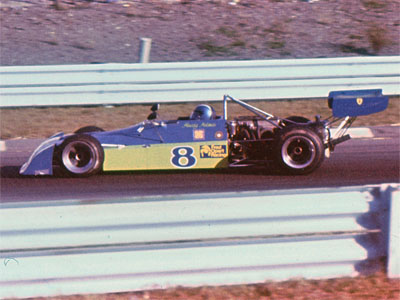 Howdy Holmes in his Chevron B27 at Watkins Glen in October 1974. Copyright Allen Brown (slide acquired on eBay) 2019. Used with permission. Howdy Holmes in his Chevron B27 at Watkins Glen in October 1974. Copyright Allen Brown (slide acquired on eBay) 2019. Used with permission.