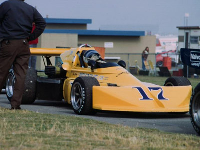 Tim Cooper in his Rutledge Oil Co March 75B at Ontario in May 1976. Copyright David Mark Pesce 2014. Used with permission.