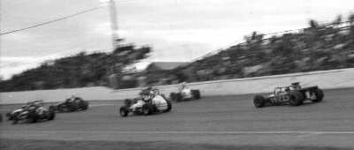 Jerry Hansen in the Lola T192 'sprint car' prepares to lap the field for the second time at Minnesota State Fair in 1973. Copyright Bill Peters 2004. Used with permission. Jerry Hansen in the Lola T192 'sprint car' prepares to lap the field for the second time at Minnesota State Fair in 1973. Copyright Bill Peters 2004. Used with permission.
