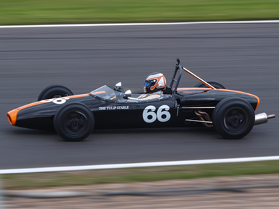 Cameron Jackson's Brabham BT2 at the Donington Historic Festival in May 2019. Licenced by Alan Raine under Creative Commons licence Attribution 2.0 Generic (CC BY 2.0). Original image has been cropped.