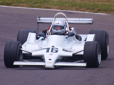 George Coghill in his Lola T760 at HSCC Anglesey in July 2019. Copyright Alan Raine 2019. Used with permission. George Coghill in his Lola T760 at HSCC Anglesey in July 2019. Copyright Alan Raine 2019. Used with permission.