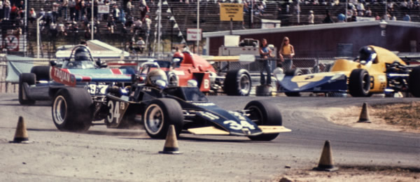 Ken Duclos in his Brabham BT40 leads the field in a SCCA National at Pocono in 1974.  Copyright David Reese 2015.  Used with permission.