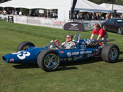 Bobby Unser in Richard Morrison's 1964 MG Liquid Suspension Spl at the Rocky Mountain Concours in 2008. Copyright Mike Rogers (Driven Imagery) 2022. Used with permission.