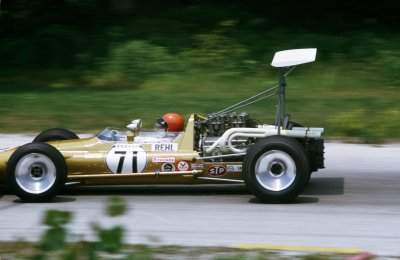 Almost too quick for the lens of Tom Schultz is Peter Rehl's Cooper T90, shown here at Road America in 1969.  Copyright Tom Schultz 2006.  Used with permission.