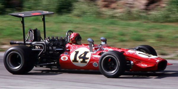 Bud Morley's fabulous red T142 at Road America in July 1969. Copyright Tom Schultz 2006. Used with permission.