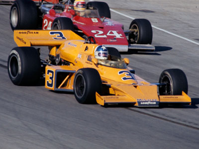 Johnny Rutherford's 1974 short track McLaren M16C, identifiable from its black roll hoop, seen here at Milwaukee. Copyright Glenn Snyder 2014. Used with permission.