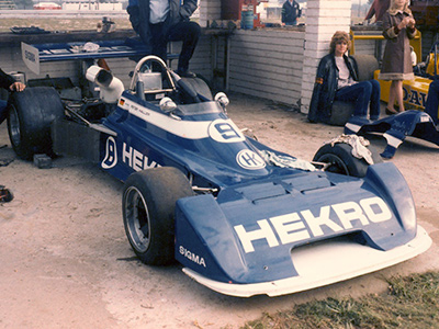 Peter Haller's Chevron B34 in the pits at Kyalami in 1982. Copyright Grant Georgopoulos 2022. Used with permission.