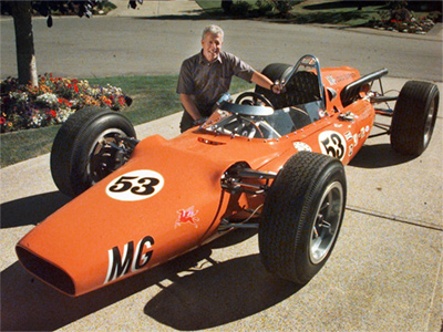 Ralph Zbarsky with his beautifully restored 1964 Huffaker Indy car. Copyright Ralph Zbarsky 2021. Used with permission.