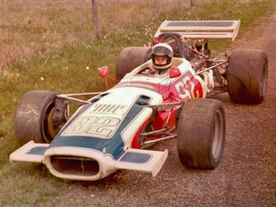 Robert Metcalf in his Lola T140 at the edge of the paddock at Aloe Field, an airport track near Victoria, Texas, in 1974. Copyright Robert Metcalf 2008. Used with permission. Robert Metcalf in his Lola T140 at the edge of the paddock at Aloe Field, an airport track near Victoria, Texas, in 1974. Copyright Robert Metcalf 2008. Used with permission.