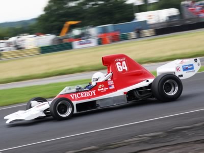 Judy Lyons in the family Lola T400 at the Croft historic meeting in August 2010. Copyright Chris Cutler 2010. Used with permission. Judy Lyons in the family Lola T400 at the Croft historic meeting in August 2010. Copyright Chris Cutler 2010. Used with permission.
