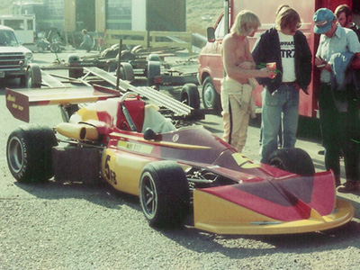 Tom Crowther's March 722/75B at Sears Point with (from left to right) Mark Blaze, Crowther, Dave Selway and Bob Schneider. Copyright Mark Blaze 2025. Used with permission. Tom Crowther's March 722/75B at Sears Point with (from left to right) Mark Blaze, Crowther, Dave Selway and Bob Schneider. Copyright Mark Blaze 2025. Used with permission.