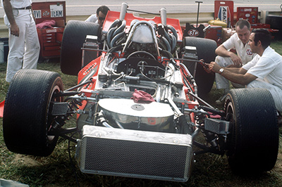 The STP crew work on Mario Andretti's McNamara 500 at IRP in July 1970. Copyright Walter Wible 2022. Used with permission.