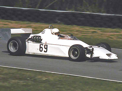 Steve Lees in his Chevron at an Oulton Park spring in 1983. Copyright Steve Wilkinson 2020. Used with permission. Steve Lees in his Chevron at an Oulton Park spring in 1983. Copyright Steve Wilkinson 2020. Used with permission.