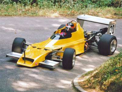 Ian Rendle in his Chevron B49 going into Martini at Wiscombe in 1991. Copyright Steve Wilkinson 2016. Used with permission.